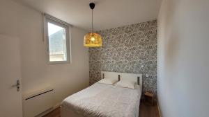 Appartements Le Gite de L-epicier : photos des chambres