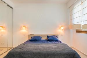 Appartements Magnifique T3 wifi, garage et climatisation a 5 min de la plage : photos des chambres
