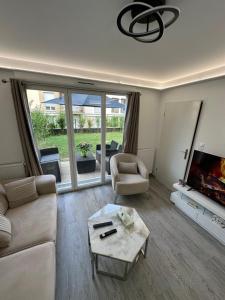 Appartements Appartement avec jardin cosy pres de Paris : photos des chambres