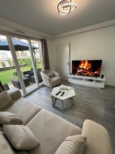 Appartements Appartement avec jardin cosy pres de Paris : photos des chambres