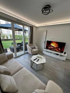 Appartements Appartement avec jardin cosy pres de Paris : photos des chambres