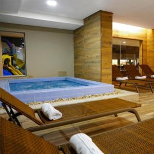 Hospedagem ao lado Thermas dos Laranjais no Enjoy Olímpia Park Resort para famílias