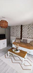 Appartements Logement lumineux bord de foret : photos des chambres