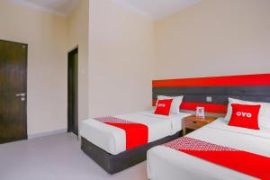 Hotel O Ari Beach Inn