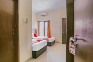 Hotel O Ari Beach Inn