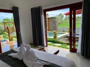 Deluxe Room Puri Uma Dewi room only