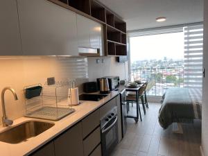 Estudio a estrenar, a pasos de Ñuñoa y con vistas increíbles