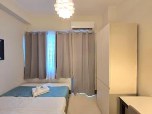 1BR Condotel with Balcony at FAME Residences #FM10