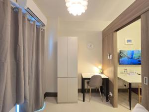 1BR Condotel with Balcony at FAME Residences #FM10