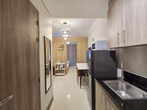 1BR Condotel with Balcony at FAME Residences #FM10