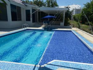 HERMOSA VILLA FAMILIAR CONDOMINIO CAMPESTRE EL PEÑON Piscina Privada Campo de Golf