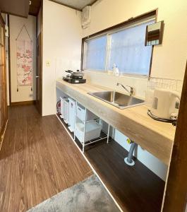 6 Min Walk from Aoto Station, Direct Access to Narita, Haneda Airports, Old house with modern renovation,