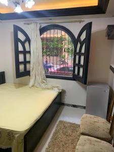 Enjoy modern cozy entire studio in a fancy building with Wi-Fi & AC and Flat screen TV in Loran in the heart of Alexandria