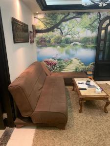 Enjoy modern cozy entire studio in a fancy building with Free Wi-Fi & AC and Flat screen TV in Loran in the heart of Alexandria