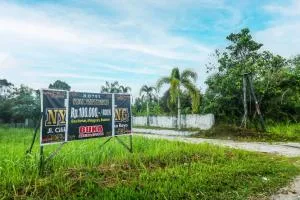 OYO 90490 Hotel Nyi Rindang Near Puskesmas Jekan Raya - 帕朗卡拉亚