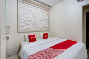 OYO Life 90606 Glass House Citraland Syariah