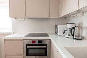 2ndhomes Unique 2-Story Apartment with Sauna & Spa