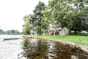 Lakefront Homey Cottage with Hot Tub Offering Pristine Views of Cobosseecontee Lake from the Deck in Winthrop, Maine - Readfield