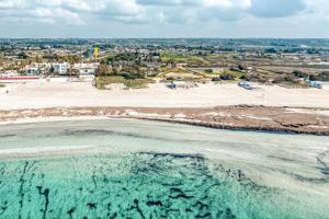 Villetta poseidone sulla spiaggia di Torre San Giovanni