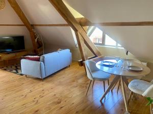 Appartements APPARTEMENT COSY 40 m2, climatise, parking gratuit : photos des chambres