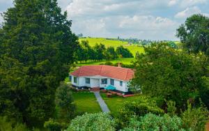 The Farmhouse, Tigoni, 1920s home, 85 acre tea farm, outdoor bath & shower