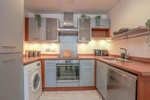 Elegant 2BR Retreat with Secure Parking