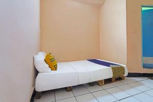 SPOT ON 91367 Rumah Bundo Syariah