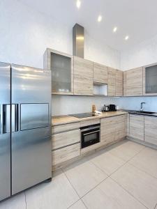 Appartements Residence du Louvre - Apartments - Prime location Palais & Croisette - Luxury Stay by LRA Cannes : photos des chambres