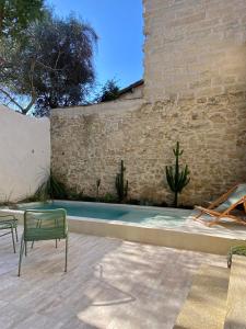 La Maison du Puisatier • Centre historique • Piscine chauffée •Jardin