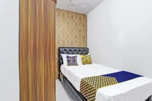 SPOT ON 91521 Mayong Guesthouse - Sekemboe