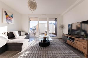 Appartements Les Jardins de la Semm - Parking et Jardin : photos des chambres