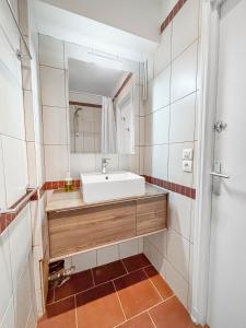 Appartements Central et chaleureux, Wifi et Cuisine equipee : photos des chambres