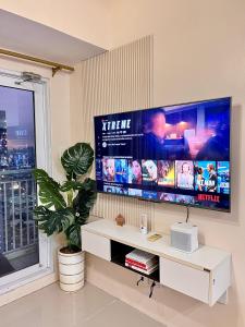 Spacious and Aesthetic 2 Bedroom with City-View Balcony at Grass Residences QC