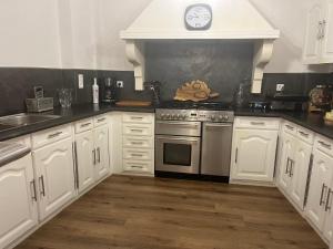 Appartements Maison de Village : photos des chambres