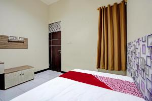 OYO 91619 Home 276 Syariah Sub