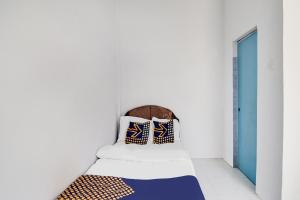 SPOT ON 91858 Raja Homestay Syariah
