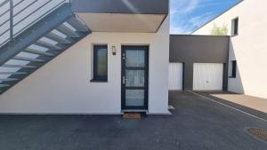 Appartements Le petit bonheur avec Jardin - T3 : photos des chambres