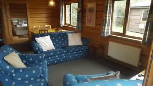 Hand built log cabin at Avonvale Holiday Lodges