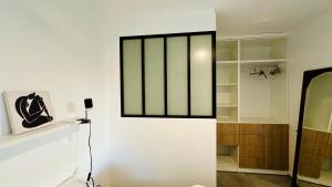 Appartements Oppidum Clim et Parking avec Terrasse de 30 m2 YourHostHelper : photos des chambres