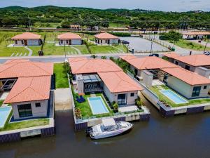 Bz94 Linda casa c/ piscina de frente para o canal! - Feriehuse, Búzios
