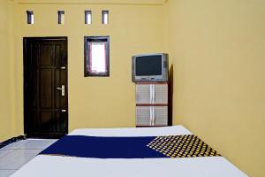 OYO Life 91947 Kost Barokah Syariah