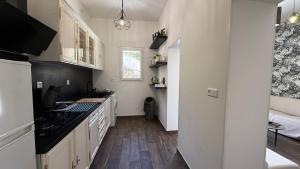 Appartements A CASA CORBAIA Appartement 40 m2, jardin prive, parking, proche centre ville et mer Apartment 40 m2, private garden parking near town center and sea port and airport : photos des chambres