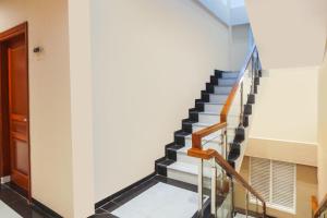 SUPER OYO Capital O 92066 Papakoel Hotel & Cafe