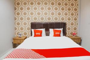 SUPER OYO Capital O 92066 Papakoel Hotel & Cafe