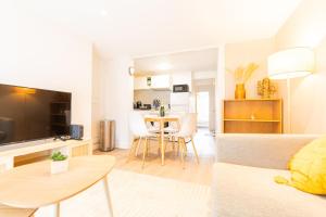 Duplex Confortable en Centre avec 2 Chambres