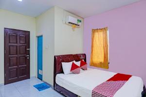OYO 92210 New Town Syariah