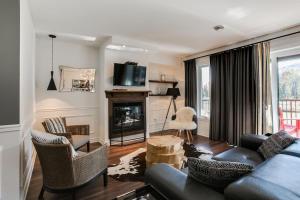 Condo Luxueux au pied du Mont