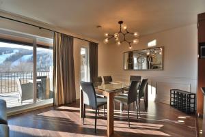 Condo Luxueux au pied du Mont