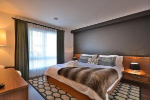 Condo Luxueux au pied du Mont