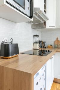 Appartements Cozy Pineapple - proche du 17 eme : photos des chambres